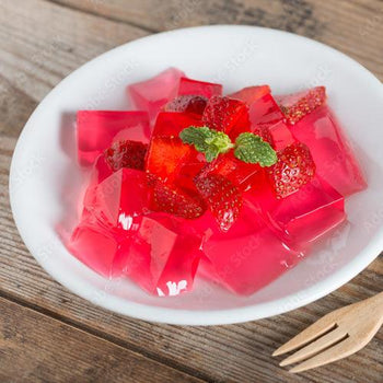 Keto strawberry gelatin dessert with a light texture, vibrant strawberry flavor, and refreshing low-carb recipe presentation