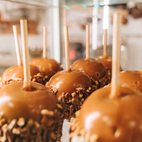 The History of Caramel and Candy Apples One on One Flavors